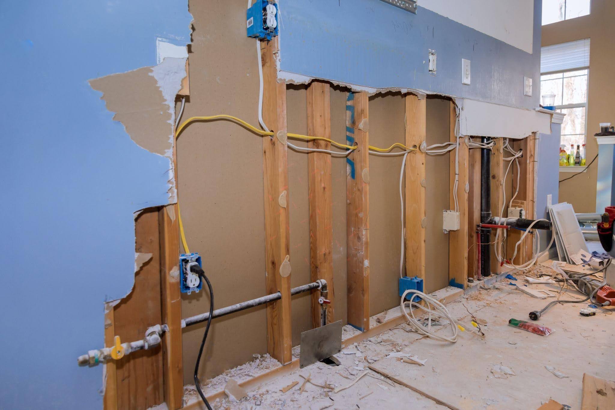 Interior view of a room with a striking blue wall and rich wood paneling